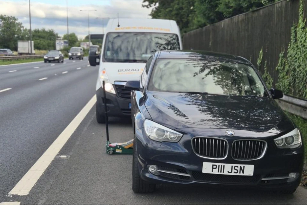 Buraq Tyres van assisting BMW breakdown on Wigan roadside